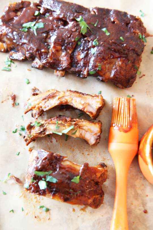 Slow Cooker Smokey BBQ Ribs Recipe. This is so easy and once the slow cooker timer goes off its ready to eat. ChopHappy.com