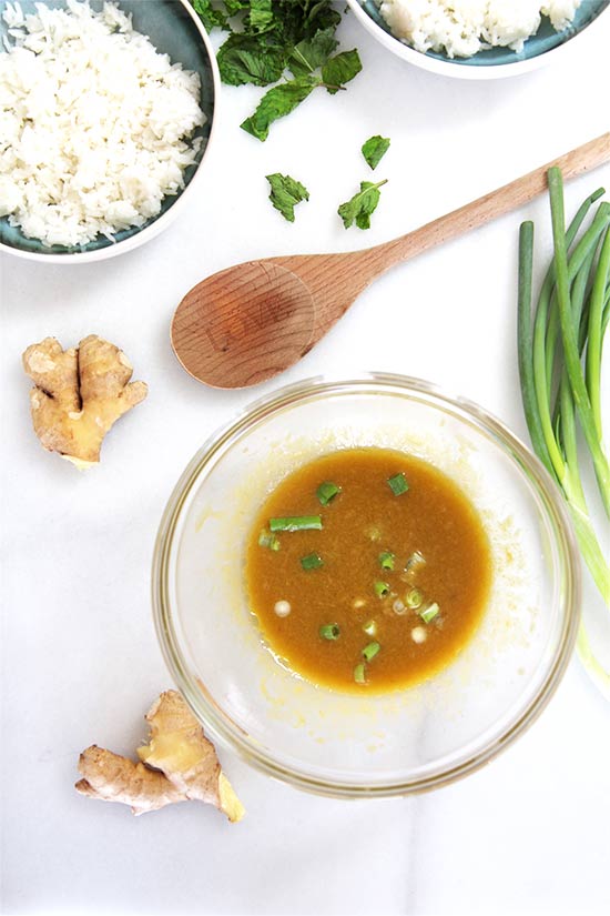 Simple Tangy Ginger Dressing Recipe-Get ready for a fun and quick Asian dressing that is so versatile! You can use it as a salad dressing, marinade for chicken, or on a rice bowl. Best part it takes less then 10 minutes to make. I www.ChopHappy.com
