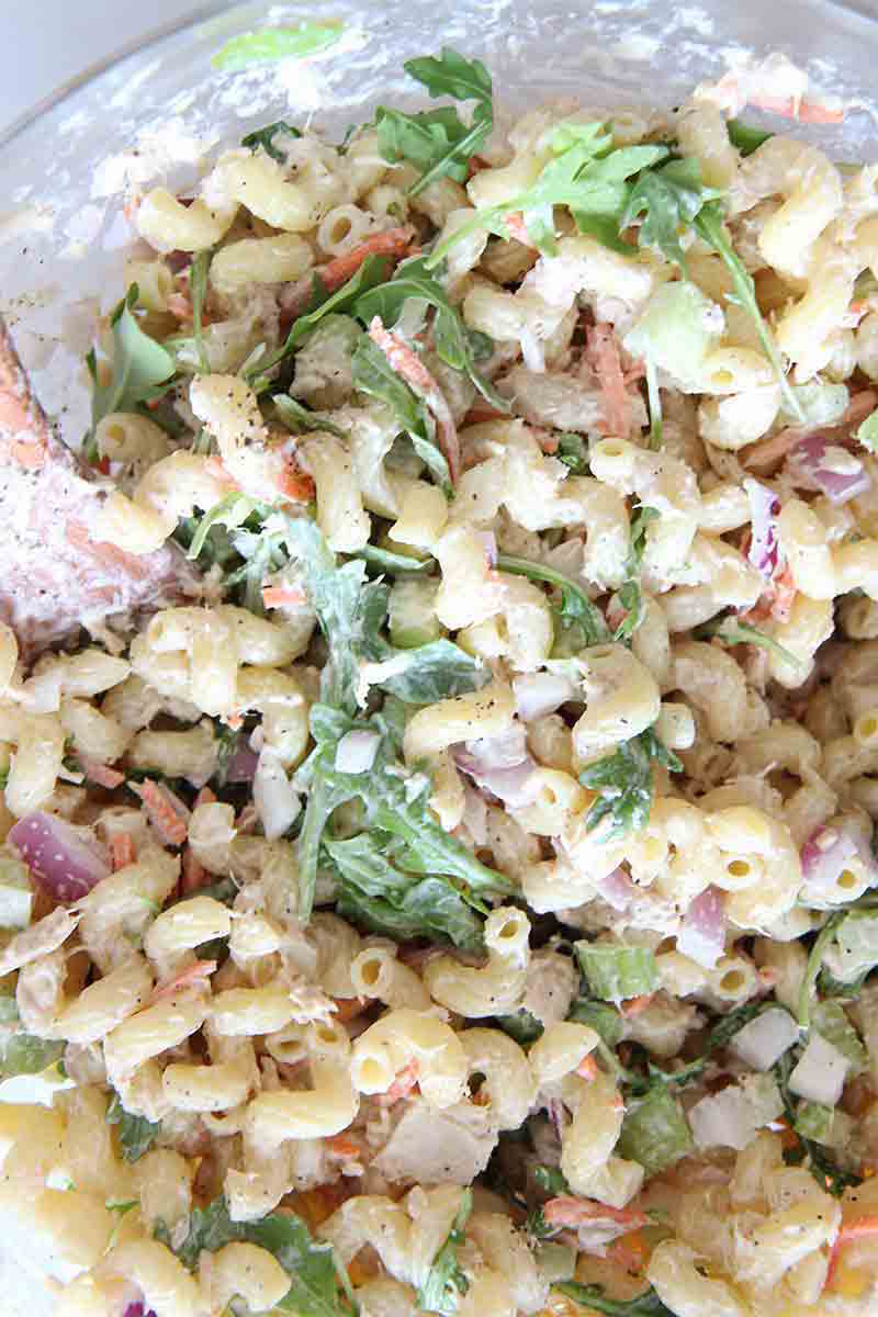 Tuna Pasta Salad Recipe- Creamy yummy smiles from this easy fabulous dinner. Tuna, crunchy carrots, and pasta makes this a perfect recipe for you to make. www.ChopHappy.com
