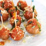 2 Ingredient Slow Cooker Meatballs Recipe - that is easy party food or Sunday family dinner. Grab sausage and sauce and comfort food love awaits. www.ChopHappy.com