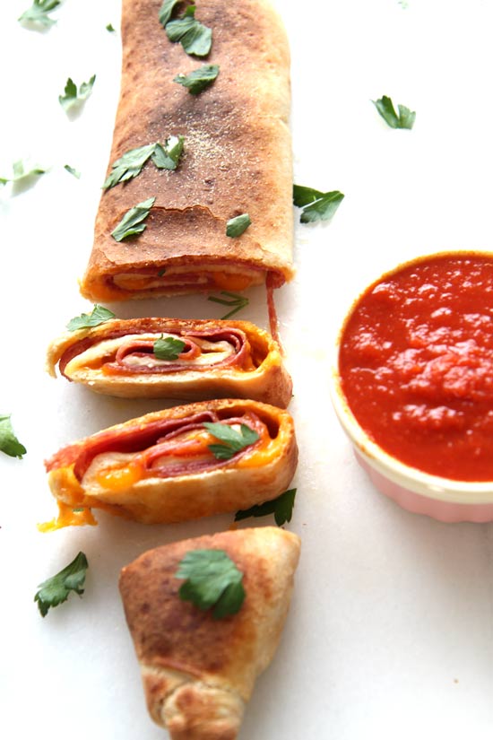 Salami Stromboli Recipe - that is whats for dinner on a busy weeknight. It takes 20 minutes from start to finish to have a hot bubbly cheesy filled dinner. www.ChopHappy.com