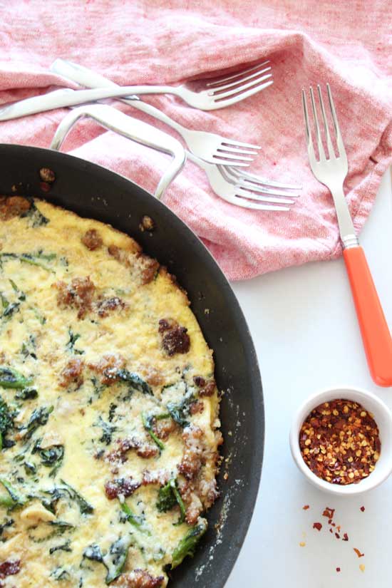Sausage and Brocoli Rabe Frittata Recipe that is the perfect one pan #breakfast for #dinner. Grab eggs, sausage, and milk. This will be super easy yum! www.ChopHappy.com