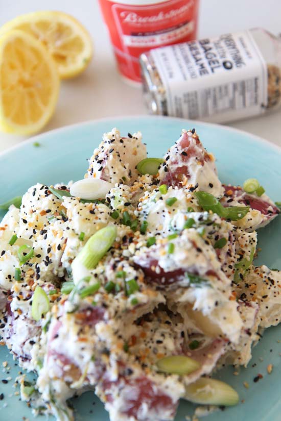 NYC Everything Bagel Potato Salad Recipe - that s creamy, make ahead, and easy to make. Fun bagel recipe becomes a starchy summer side dish. Happy Cooking. www.ChopHappy.com