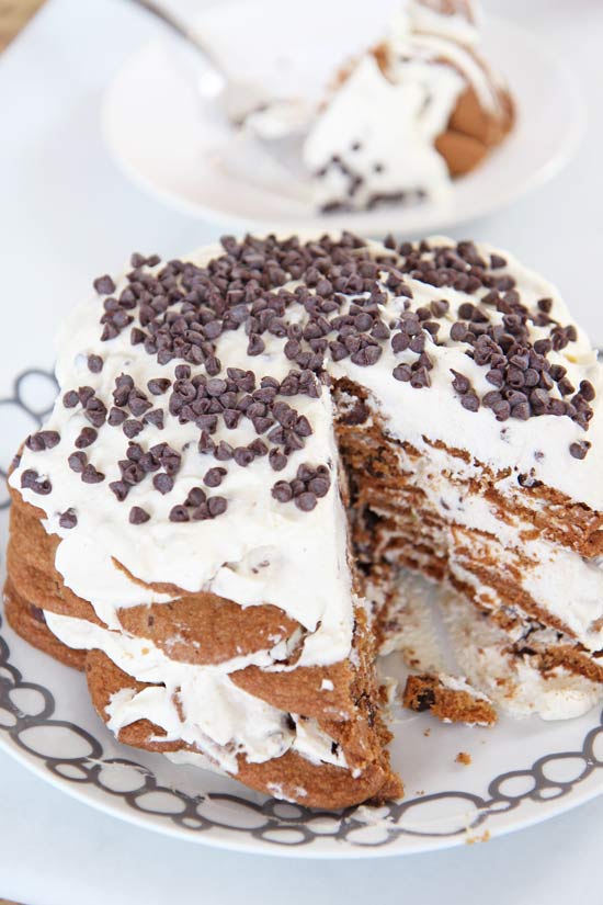 Cannoli Ice Box Cake Recipe. This is the easiest no bake dessert. Whip cream add ricotta, and warm spices. Layer cream and cookies. Then eat this indulgent cake. www.ChopHappy.com #cookies #iceboxcake #cannoli
