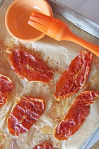 Sheet Pan Crispy Honey Prosciutto Recipe. Simple sheet pan recipe with 2 ingredients. Grab porky prosciutto, honey and brunch smiles. This is perfect with eggs, on a blt, or as a crispy salty snack. Happy cooking! www.ChopHappy.com #sheetpanmeal #prosciuttorecipe