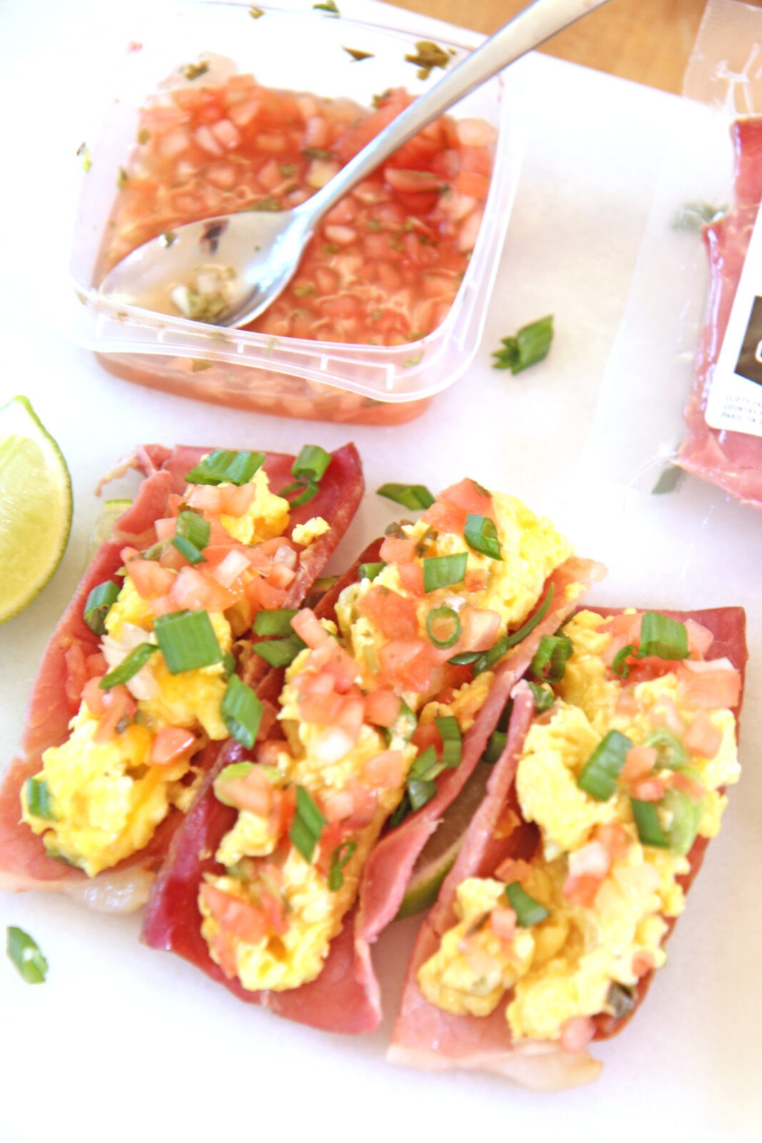 Breakfast Taco With Ham Shell Recipe. Easy gluten free and keto friendly brunch recipe. This recipe includes eggs, Greek yogurt, ham and other breakfast fun. Happy Cooking! www.ChopHappy.com #breakfasttacos #tacoTuesday