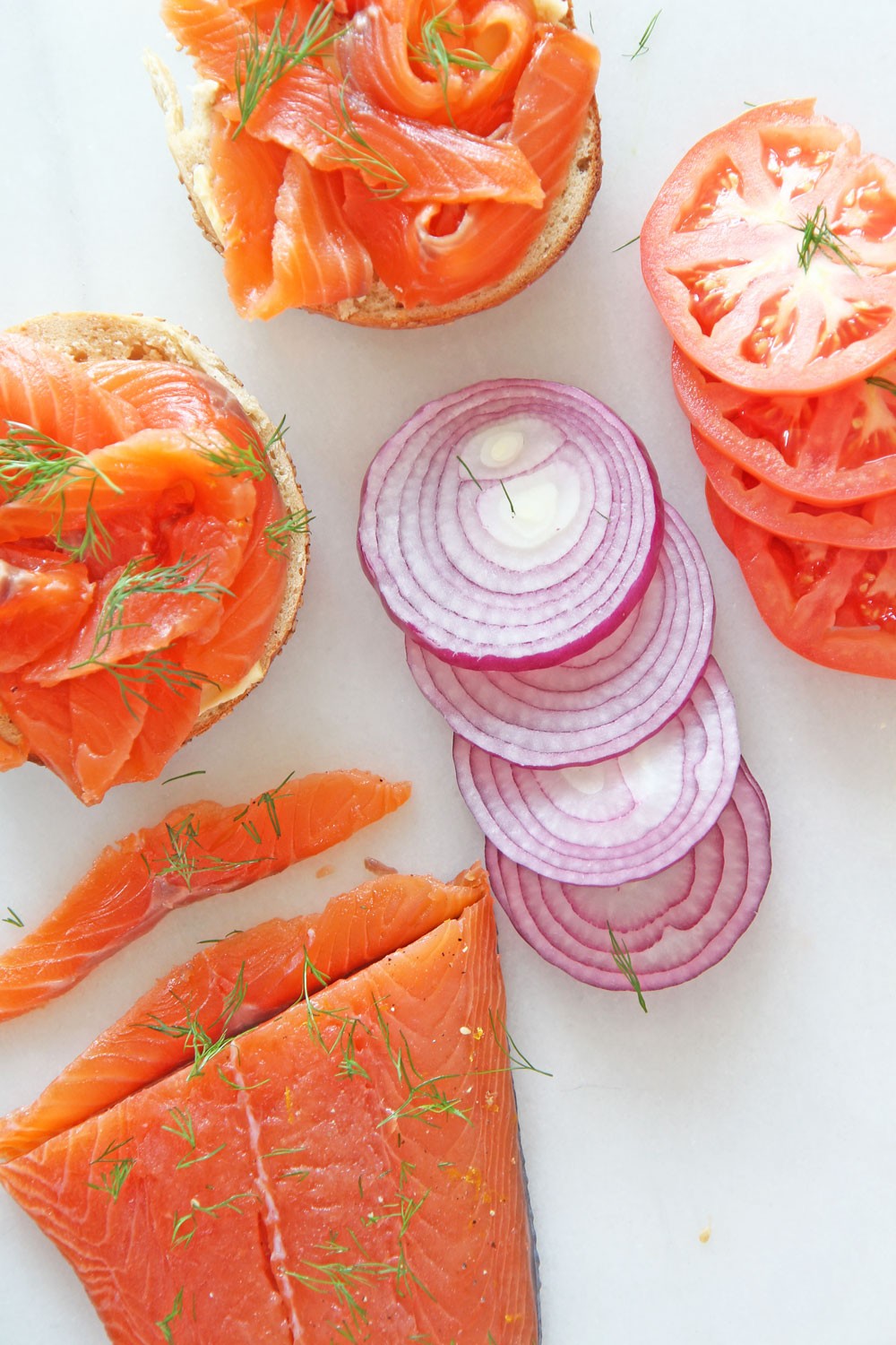 How To Make Homemade Lox (gravlax). NYC bagel classic that is as easy as salt and sugar. This salmon recipe is all done in the fridge and is a perfect brunch idea. Happy Cooking! www.ChopHappy.com #gravlax #homemadelox