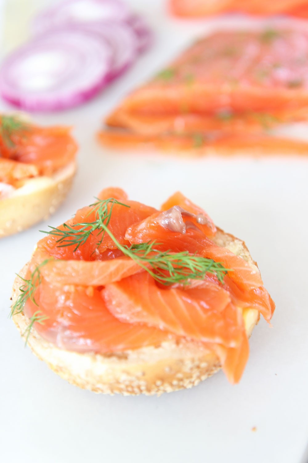 How To Make Homemade Lox (gravlax). NYC bagel classic that is as easy as salt and sugar. This salmon recipe is all done in the fridge and is a perfect brunch idea. Happy Cooking! www.ChopHappy.com #gravlax #homemadelox