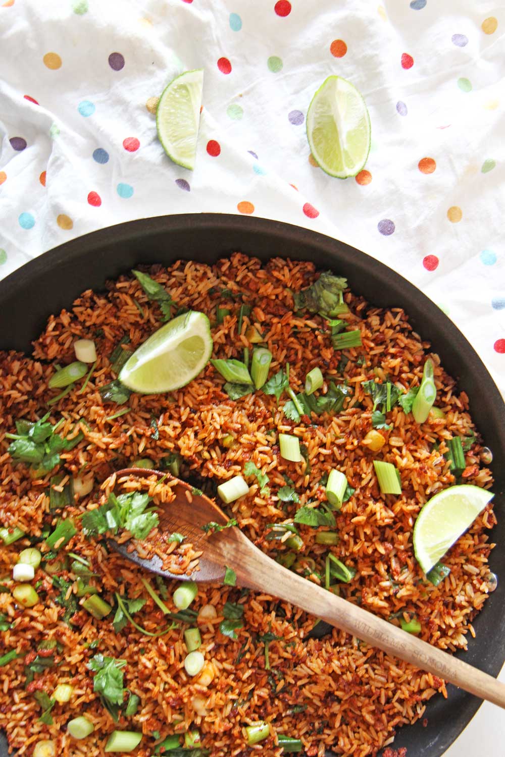 5 Ingredient Taco Fried Rice. Easy dinner for busy families. Rice, chorizo, scallions, cilantro, and lime. Also amazing leftovers. Happy Cooking! www.ChopHappy.com #friedrice #taco