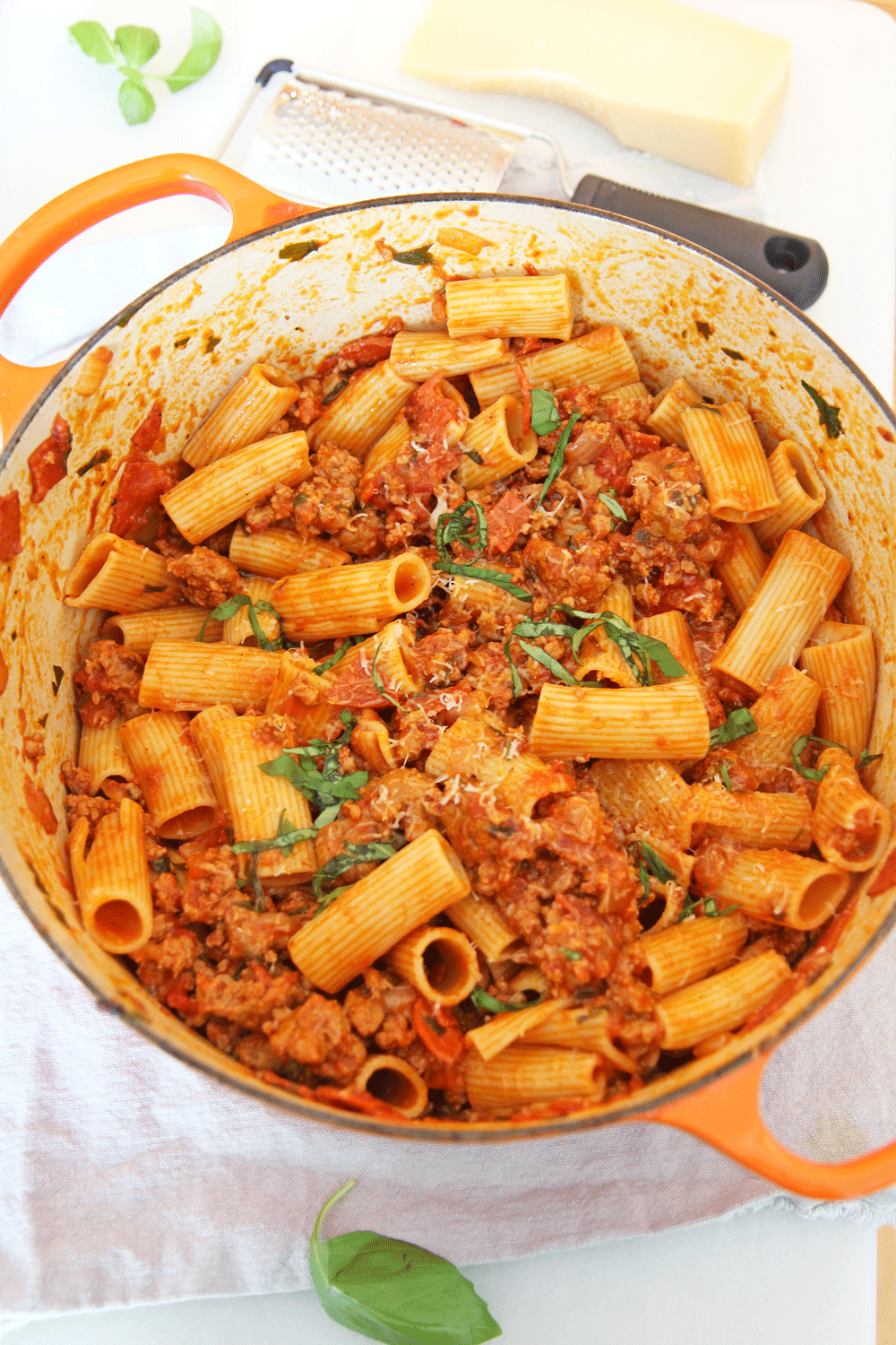 How To Make The Best Meat Sauce in Under 30 Minutes. Use pepperoni, Italian sausage, onions, and jarred marinara. www.ChopHappy.com #meatsauce #Bolognese 