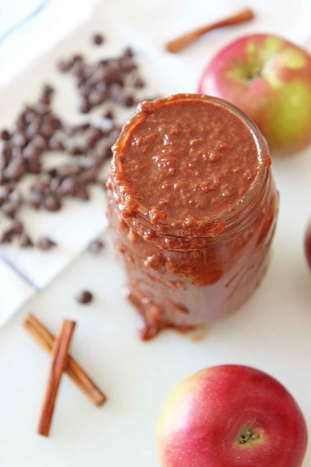 How to Make Chocolate Applesauce in a Slow Cooker.Apples, butter, brown sugar, cinnamon, orange juice, and salt are all you need. This is an easy slow cooker recipe for fall or Hanukkah. Happy apple cooking! www.ChopHappy.com #applerecipes #applesauce