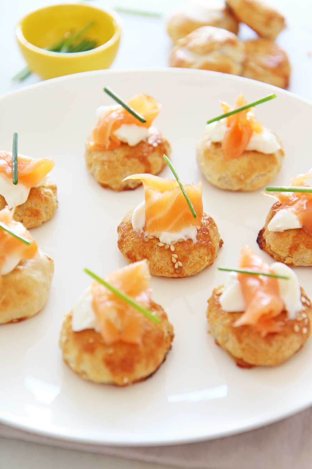 Lox and Potato Knish Recipe. This is potato knish, lox, sour cream, and chives. This is the perfect New Years appetizer, Holiday appetizer, or game night eats. This is super easy. Happy Cooking! www.ChopHappy.com
