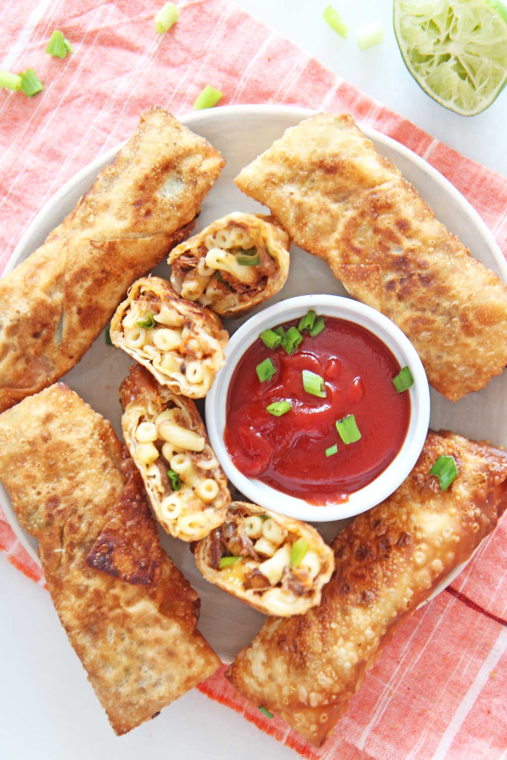 Leftover Mac and Cheese Egg rolls. Leftover Mac and cheese, short ribs, scallions, and lime make this the perfect leftover remake! www.ChopHappy.com #leftovers #eggrolls
