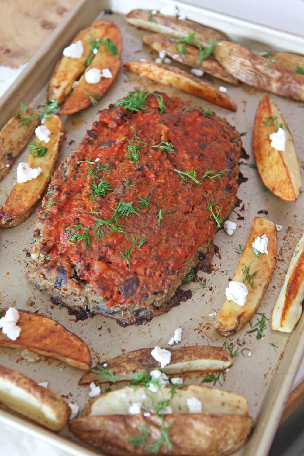 How To Make Eggplant Meatloaf Recipe. This is the perfect meatless Monday sheet pan dinner. The whole meatloaf is made from eggplant, pantry seasonings, cheese olives, and herbs. Perfect vegetarian meatloaf recipe. Happy Cooking! www.ChopHappy.com #eggplantrecipe #vegetarianmeatloaf