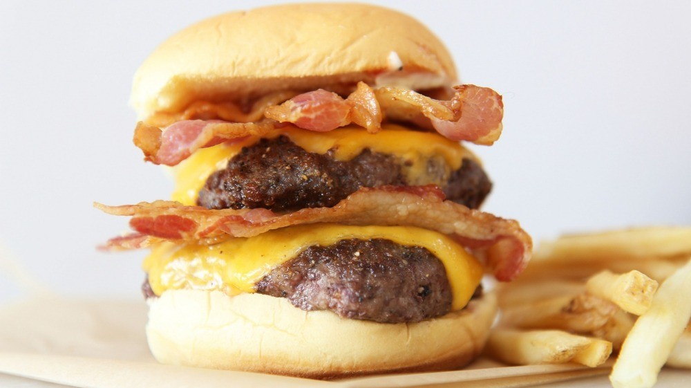 Wendy's Baconator Burger Copycat Recipe. This is super easy and faster then takeout! Burger, cheese, lots of bacon, ketchup, and mayo is all you need. Happy Cooking! www.ChopHappy.com #Wendy's #burgerrecipe