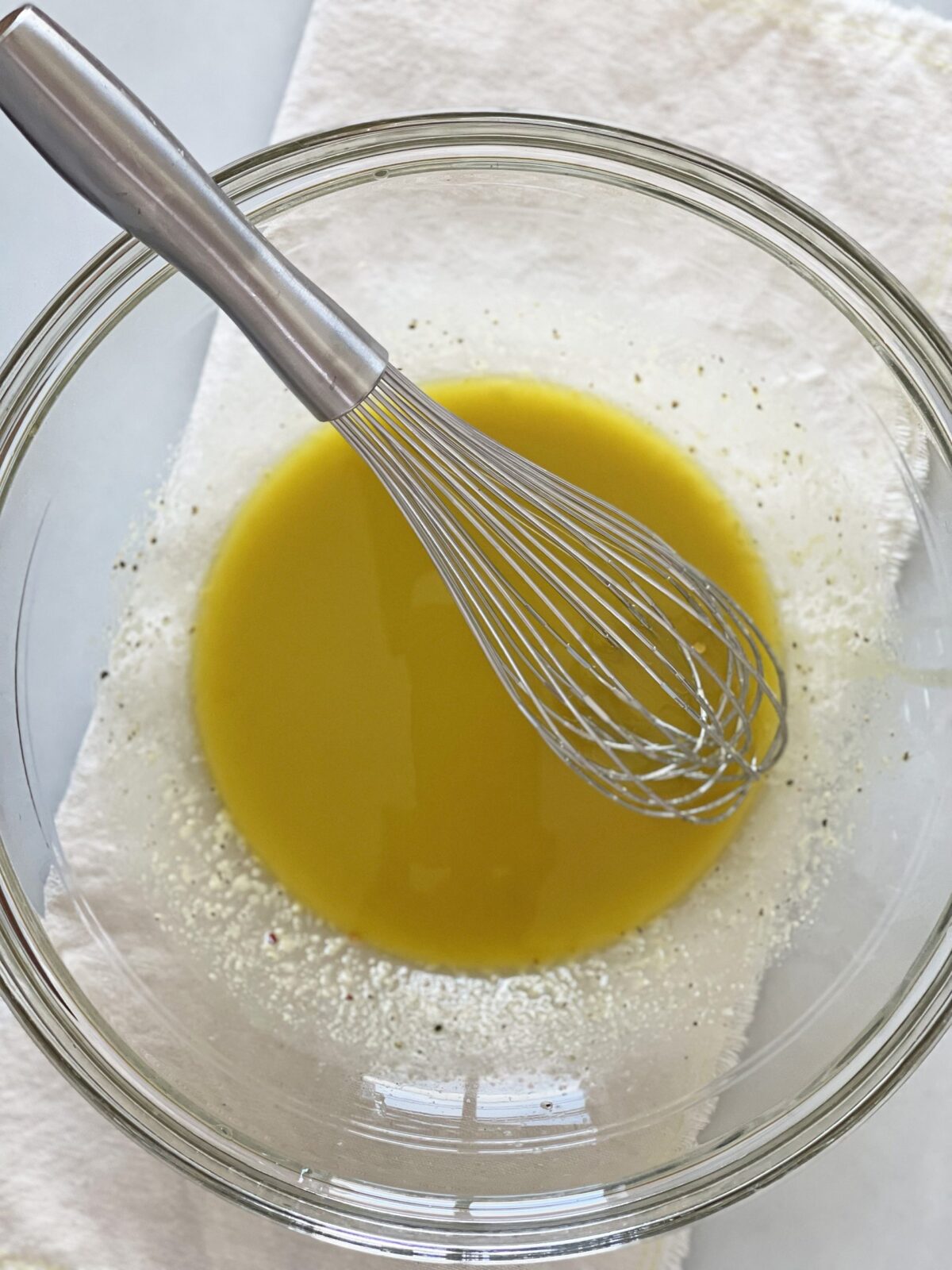 Lemon Lime Vinaigrette Recipe. Lemon, lime, Dijon mustard, and good olive oil is all you need for this recipe! Easy dressing recipe! www.ChopHapy.com #vinaigretterecipe #saladdresing