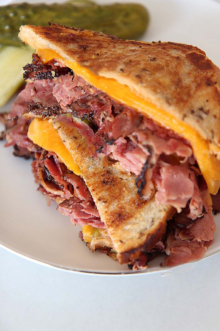 Jewish Grilled Cheese Recipe. This is classic NYC eats. The iconic Carnegie Deli has the best pastrami. I used their pastrami, half sour pickles, and Russian dressing to make the ultimate grilled cheese. Happy Cooking! #NYCeats #grilledcheese