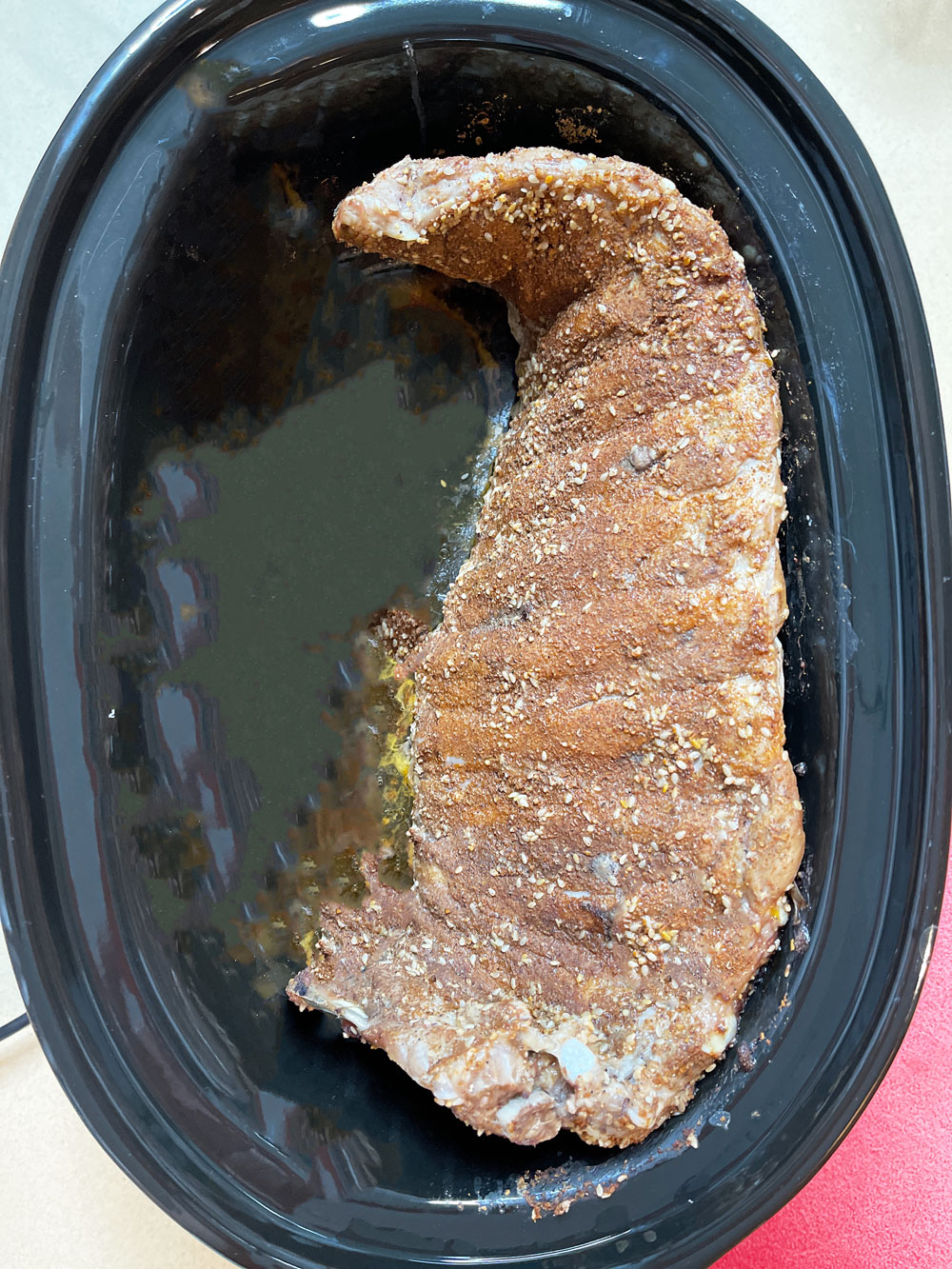 The Best Slow Cooker Ribs. The juiciest ribs can be made in the crock pot with very little work. Happy Cooking! www.ChopHappy.com #ribsrecipe #slowcookerrecipe