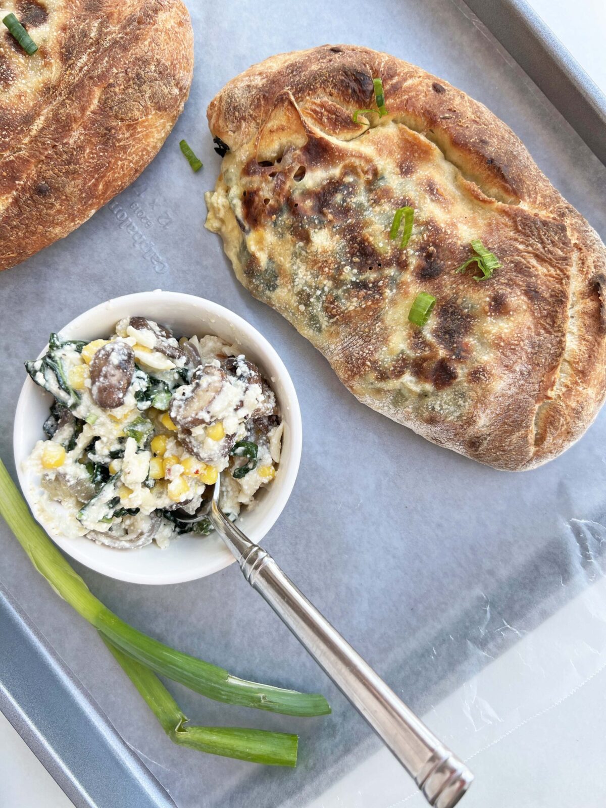 California Cheesy Calzone recipe. This is a perfect comfort food recipe, dinner idea, or part food recipe. Kale, jalapeño, Monterey jack cheese, and pizza dough make this calzone tasty. Happy Cooking! www.chophappy.com #calzone #easyrecipe